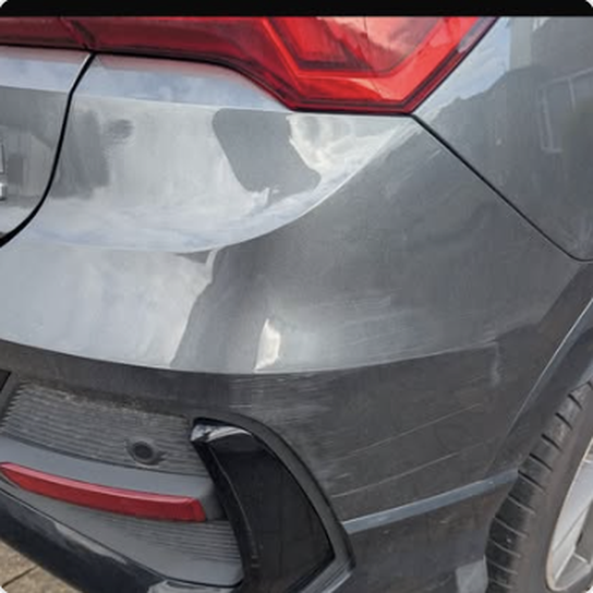 Close-up of repaired vehicle panel